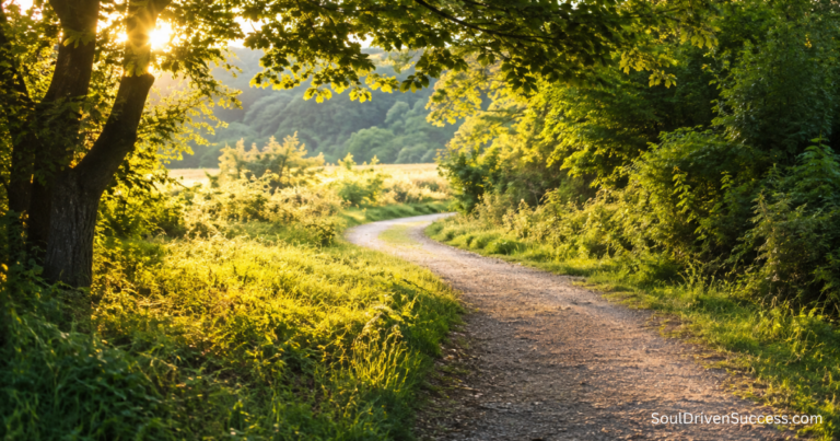 Sunlit winding path through a peaceful green woodland, symbolizing flexibility, resilience, and navigating unexpected changes in life and business.